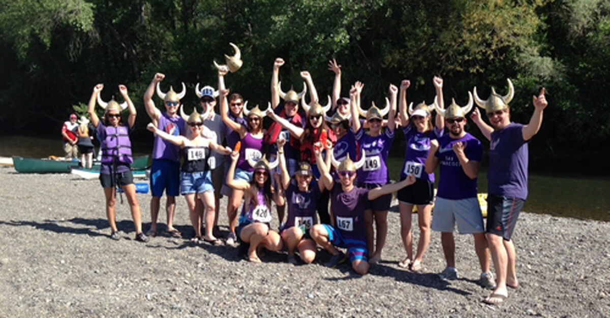 Group of people standing at the Russian River