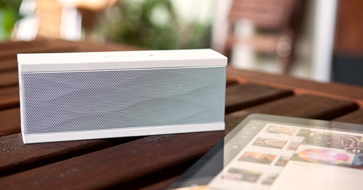 Portable speaker on Teak Table