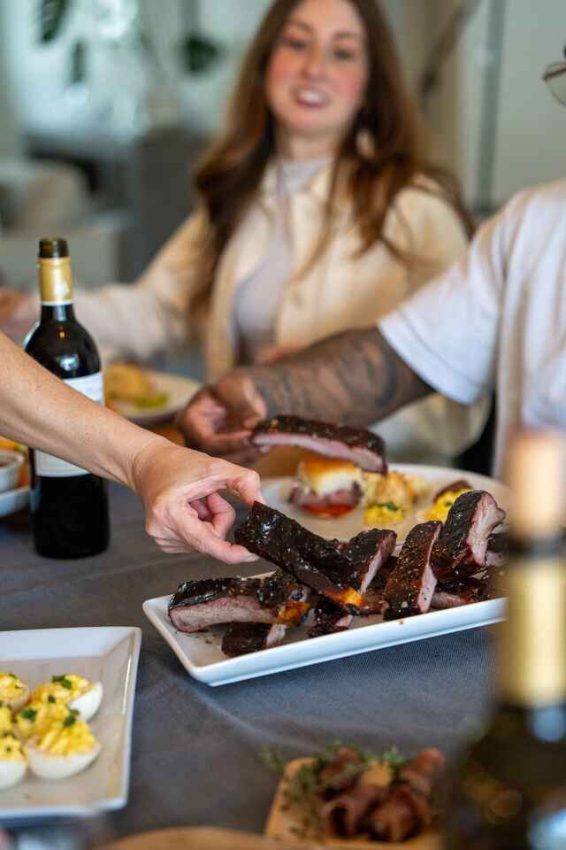 Serving BBQ spare ribs Serving BBQ spare ribs