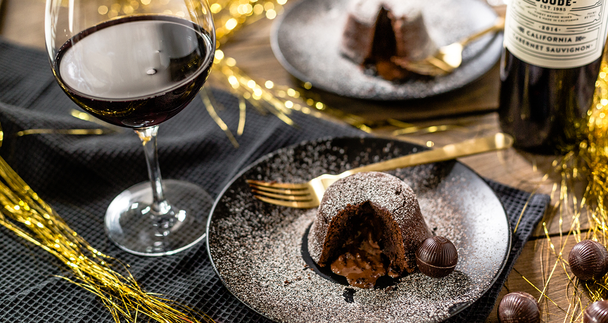 Dak Chocolate Molten Lave Cake on a plate with New Year's decorations