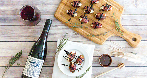 Prosciutto Wrapped Dates Stuffed with Goat Cheese and Fig Marmalade